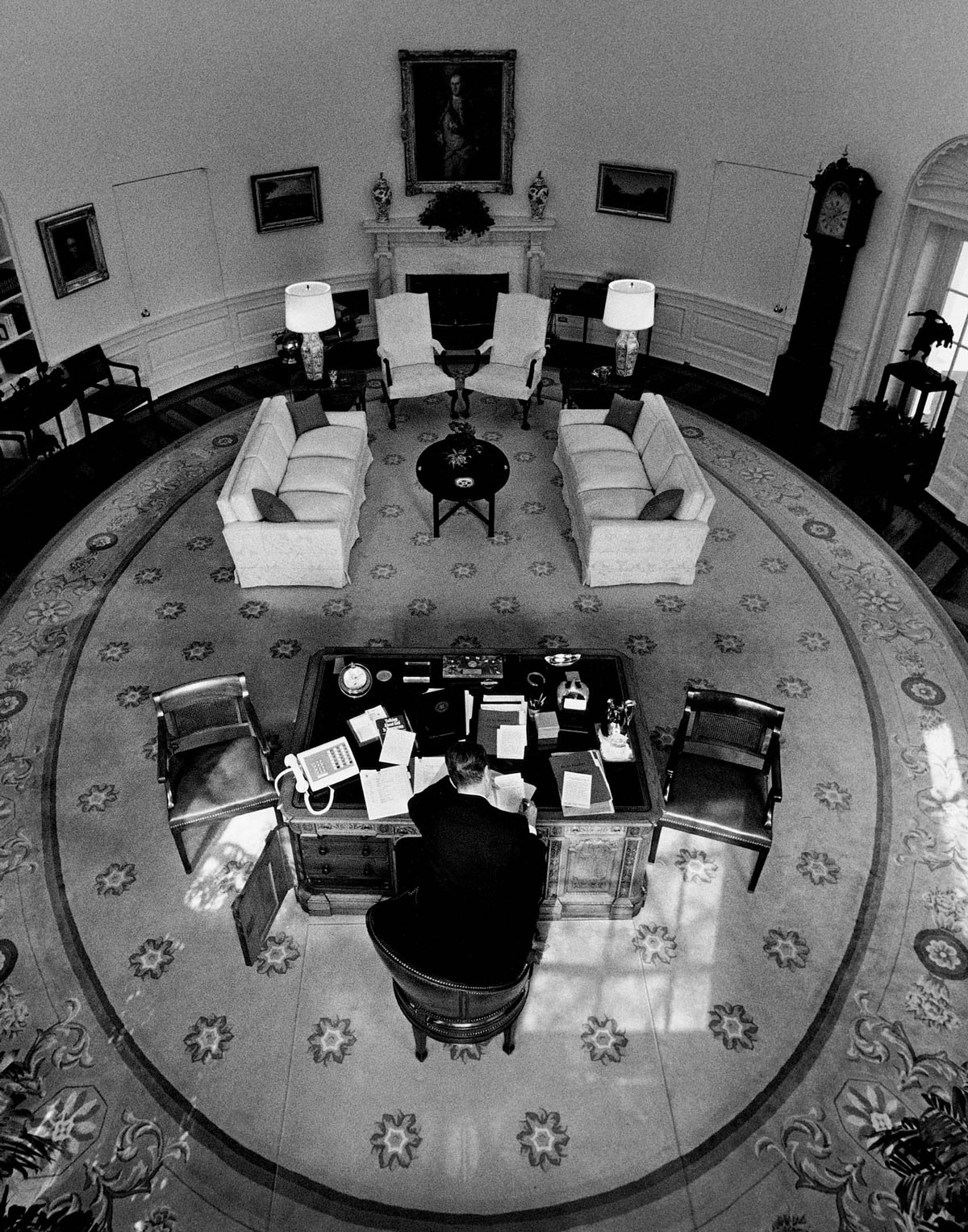 Aerial view of the Reagan Pete Souza at a desk