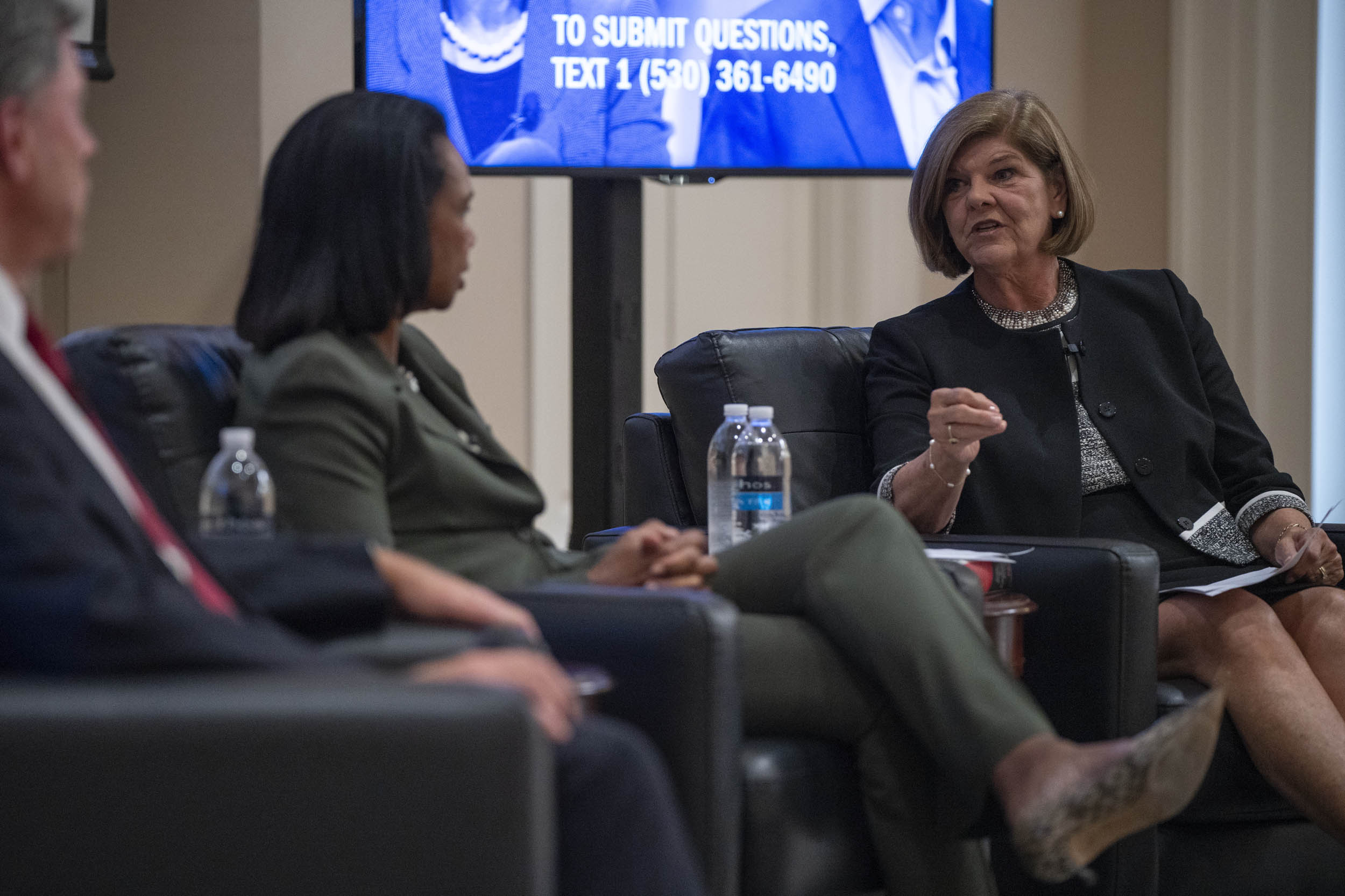 Ann Compton, right,  talking to Condoleezza Rice