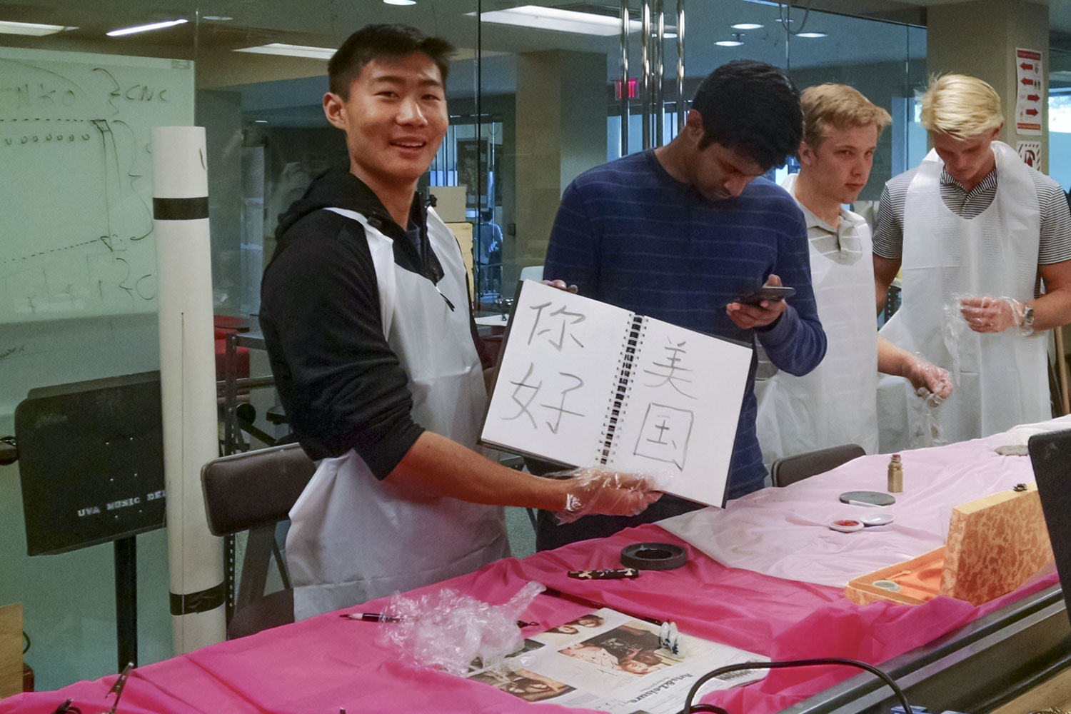 Richard Song demonstrates Chinese calligraphy, which he learned from his grandparents. 