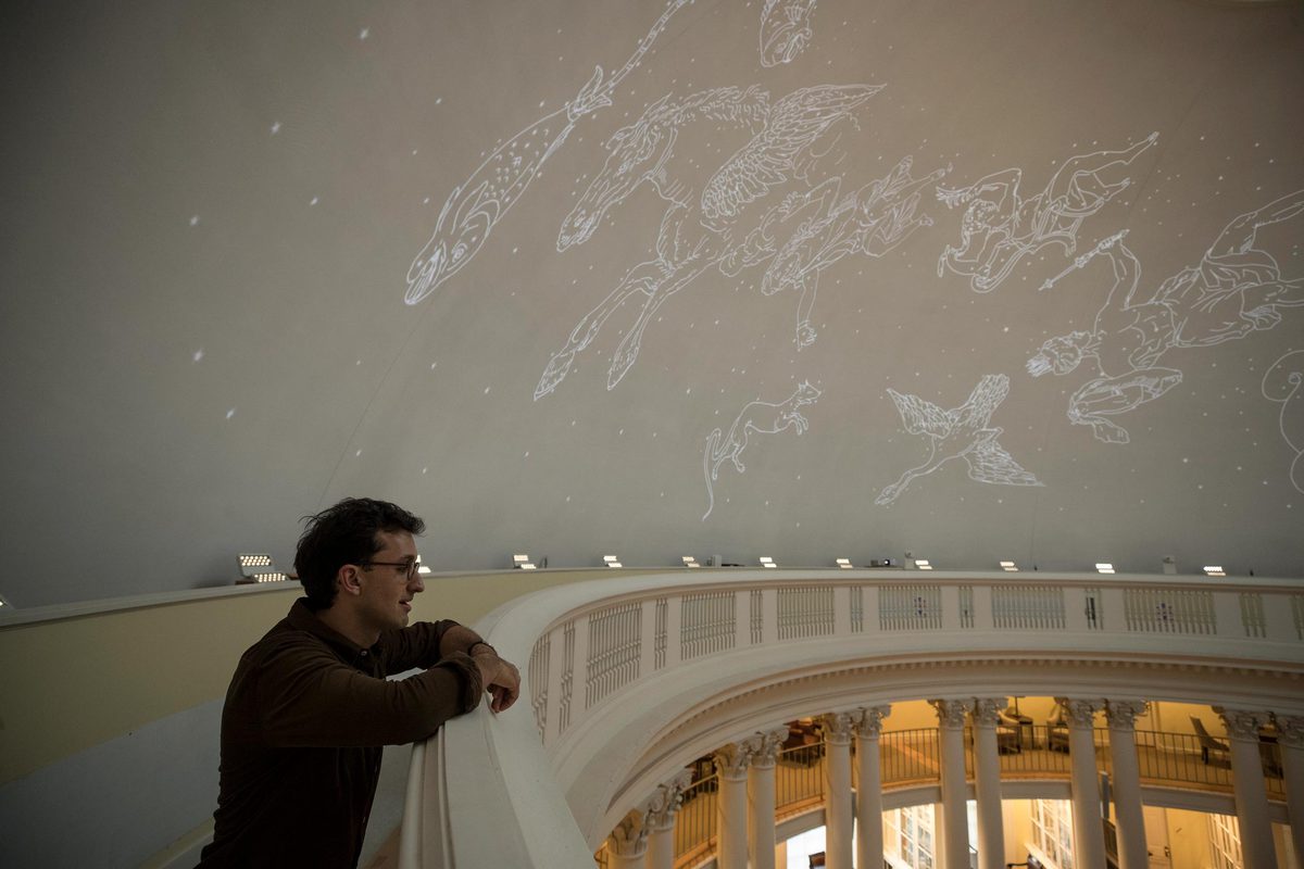 Sam Lemley looks at the constellations in the Rotunda dome