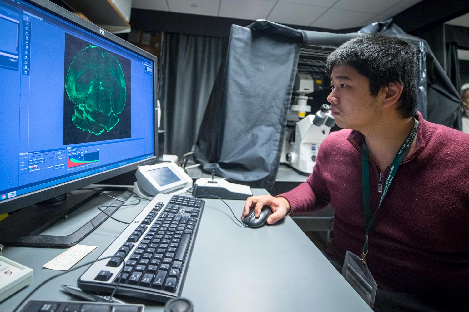 Ruofan Cao working on a computer