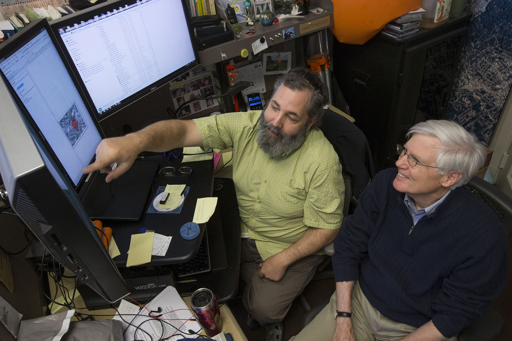 Chris Gist, left, and Benjamin Ray, right, used geographic information systems technology in UVA’s Scholar’s Lab to help identify the execution site in Salem. (Photo by Dan Addison)