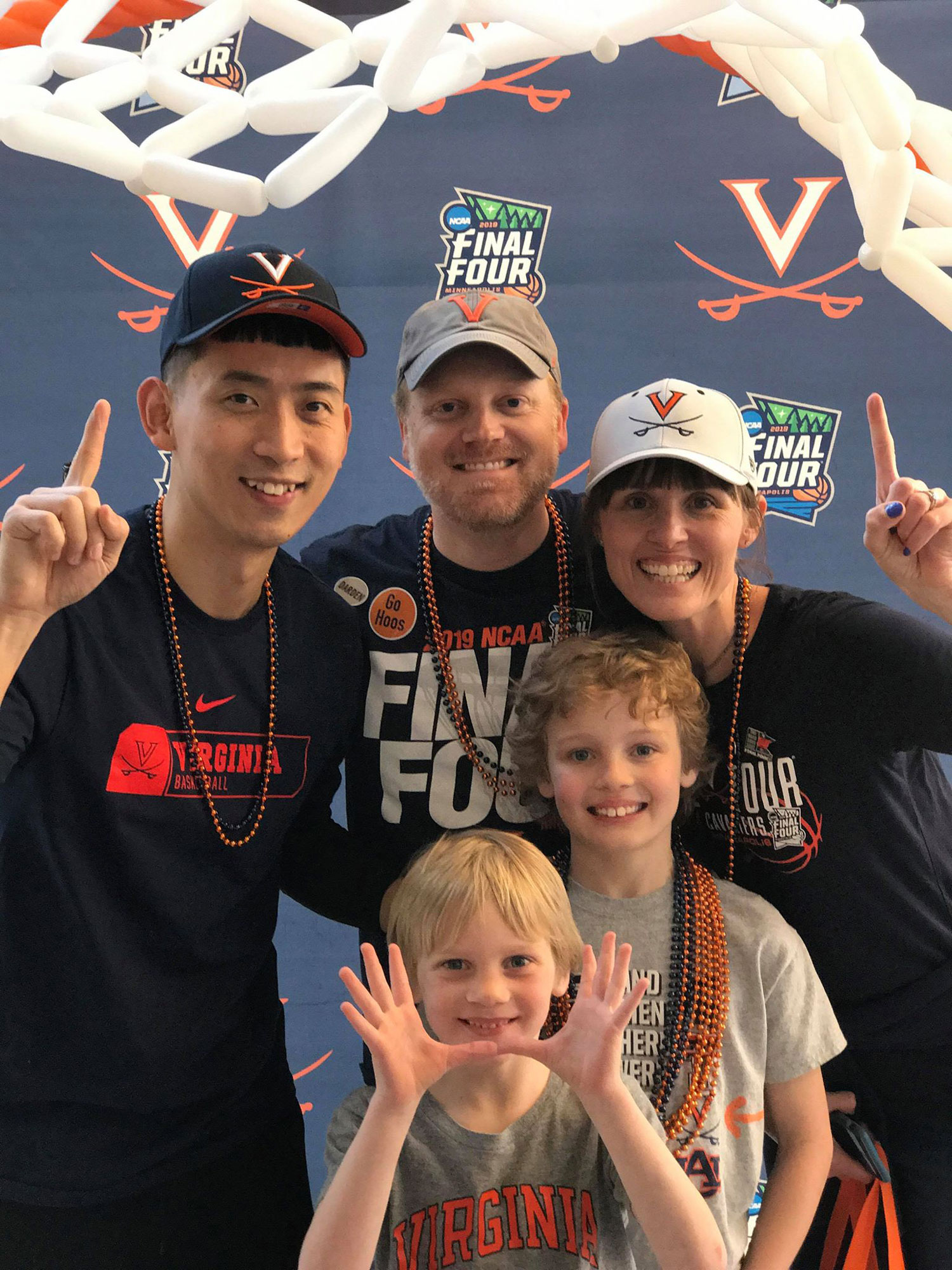 Sy with his host family, the Wallaces pose for a group photo at the final four