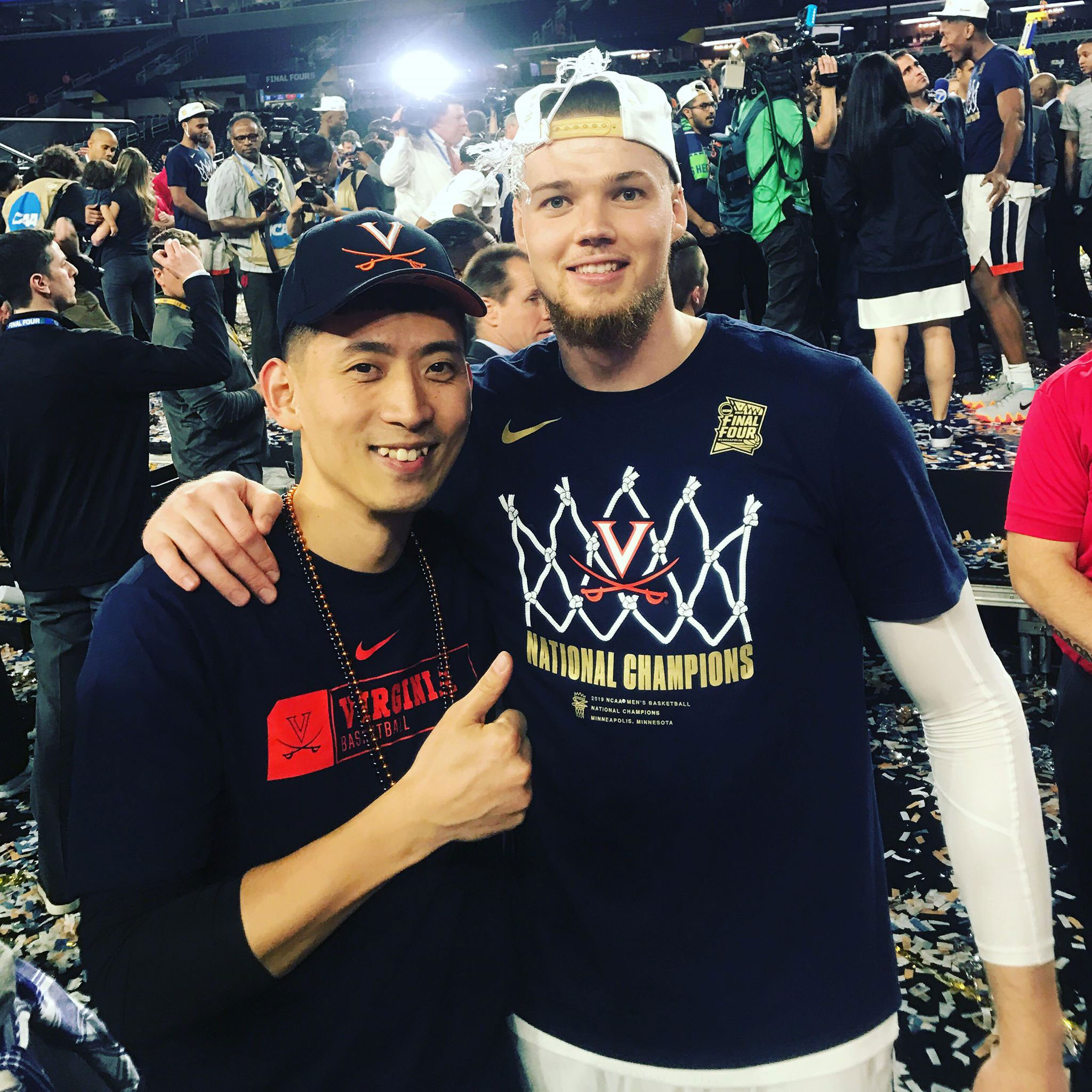 Mike and Sal stand together for a picture after UVA wins the Final Four