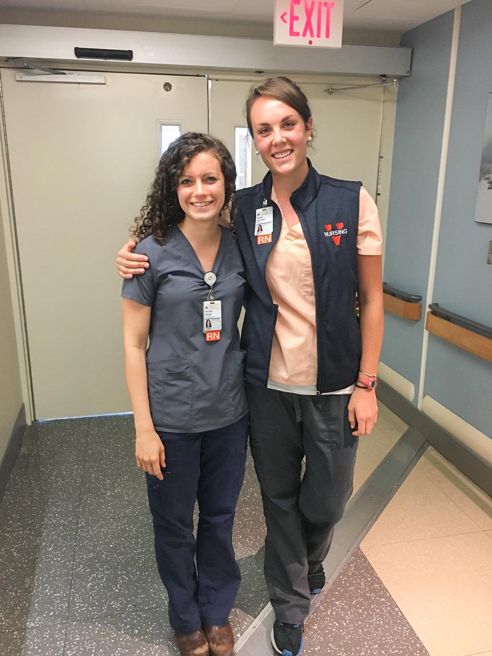Sarah Borchelt (right) poses with fellow RN for a picture together