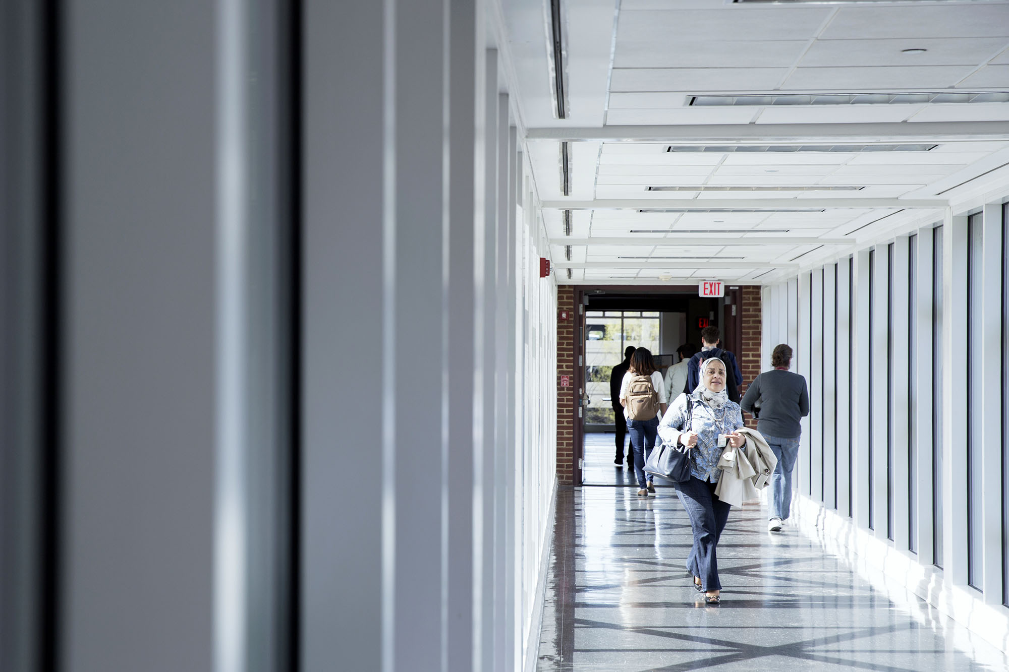 Students walking down a hallway