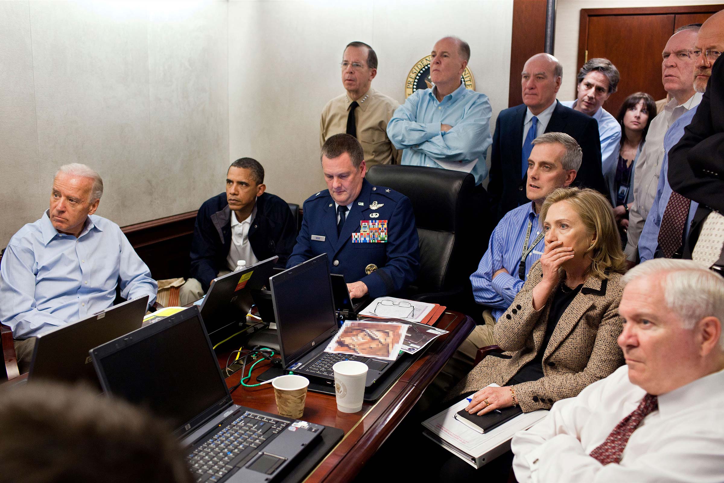 Obama in the Situation room with US officials watching an attack take place