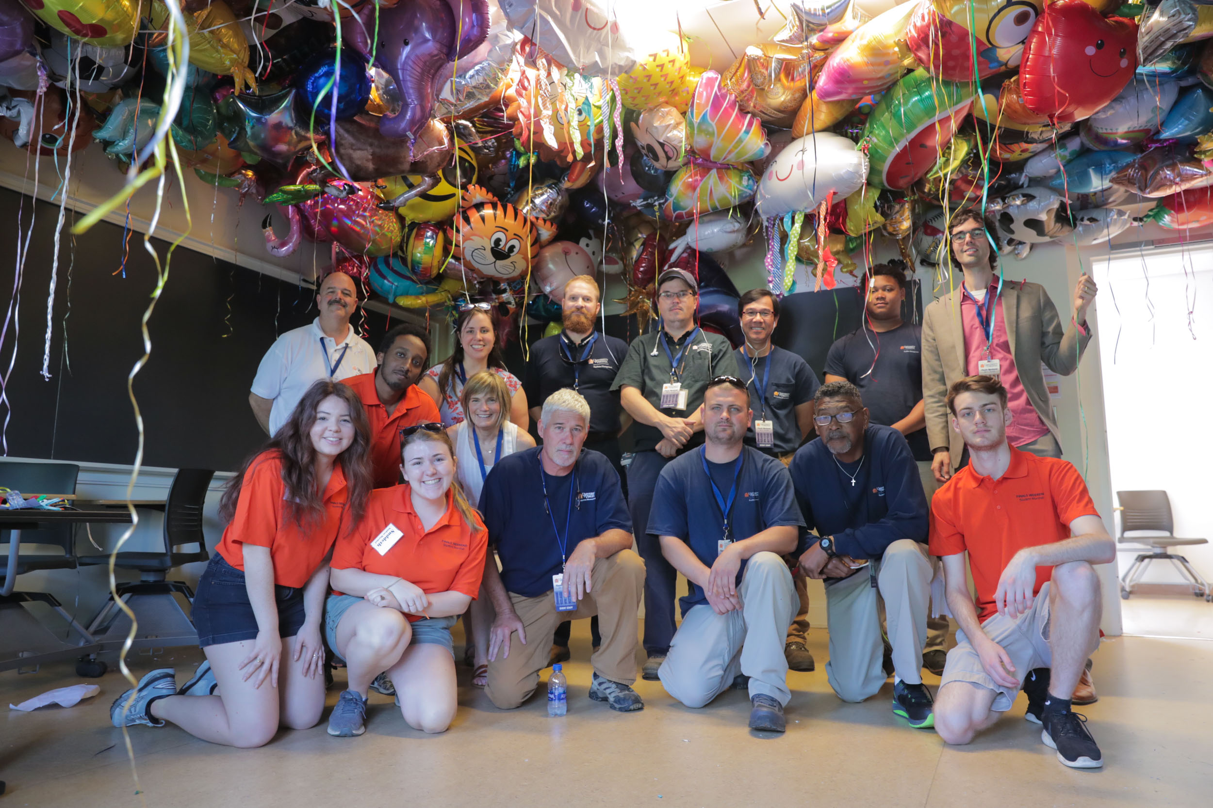 Group of volunteers with all of the balloons they collected from Graduation for UVAs Children Hospital