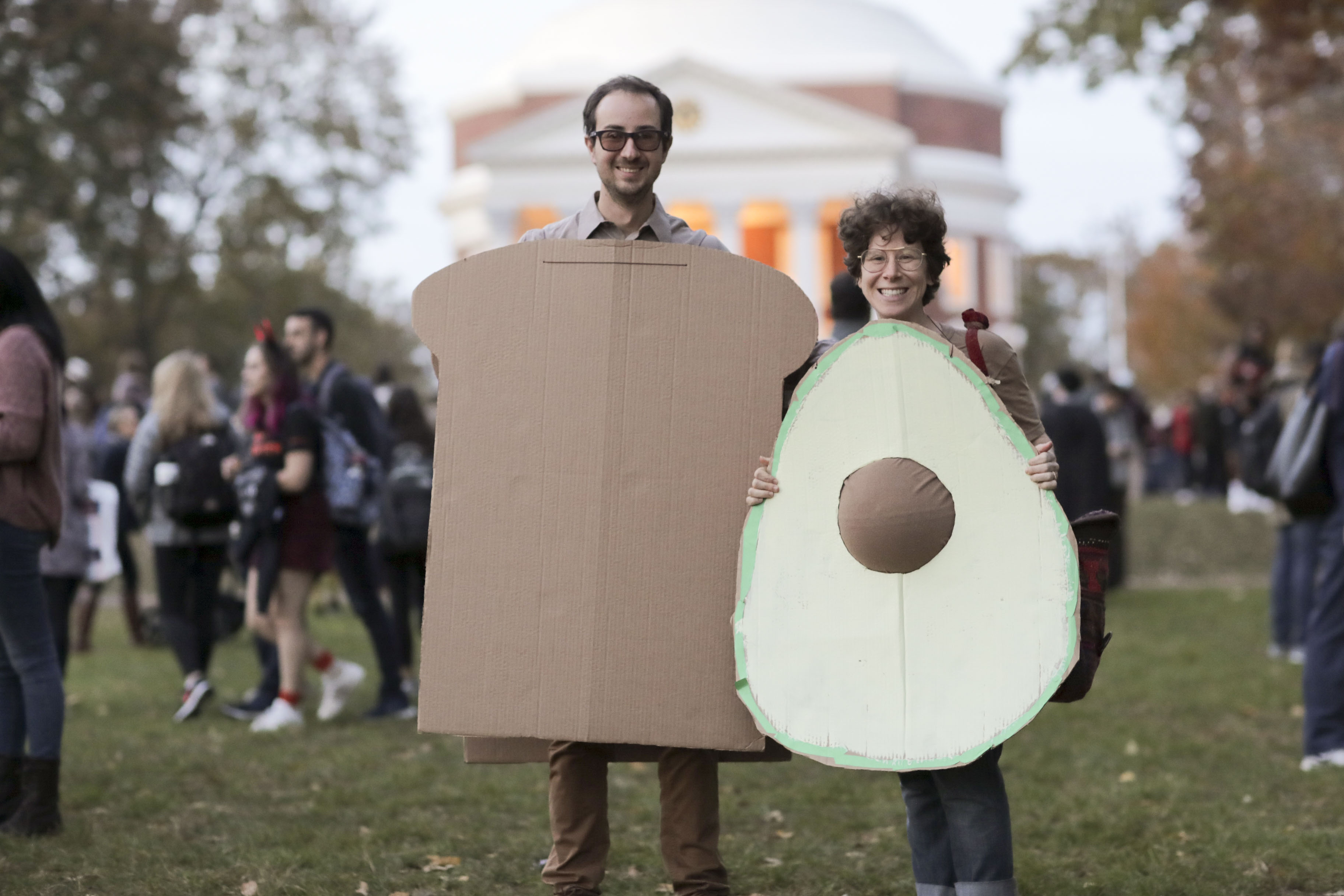 Man dressed as toast and woman dressed as an avocado