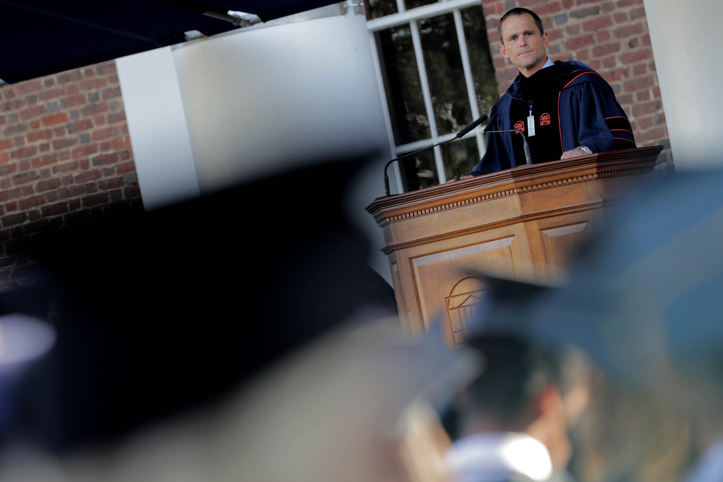  President Jim Ryan Standing at a podium giving a speech during graduation