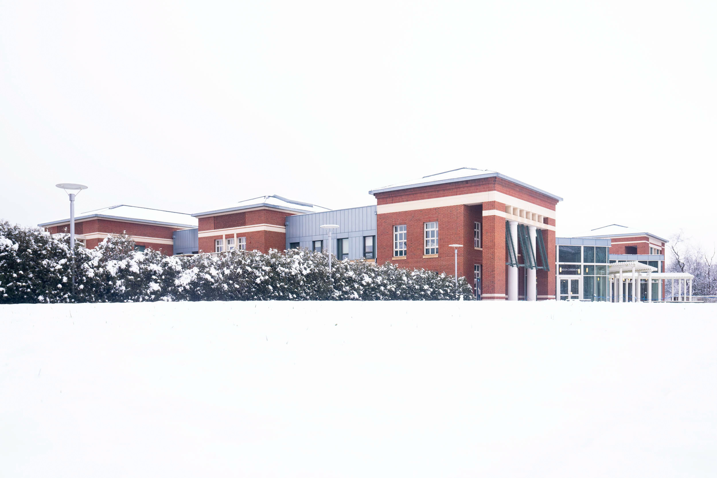UVA building covered in snow