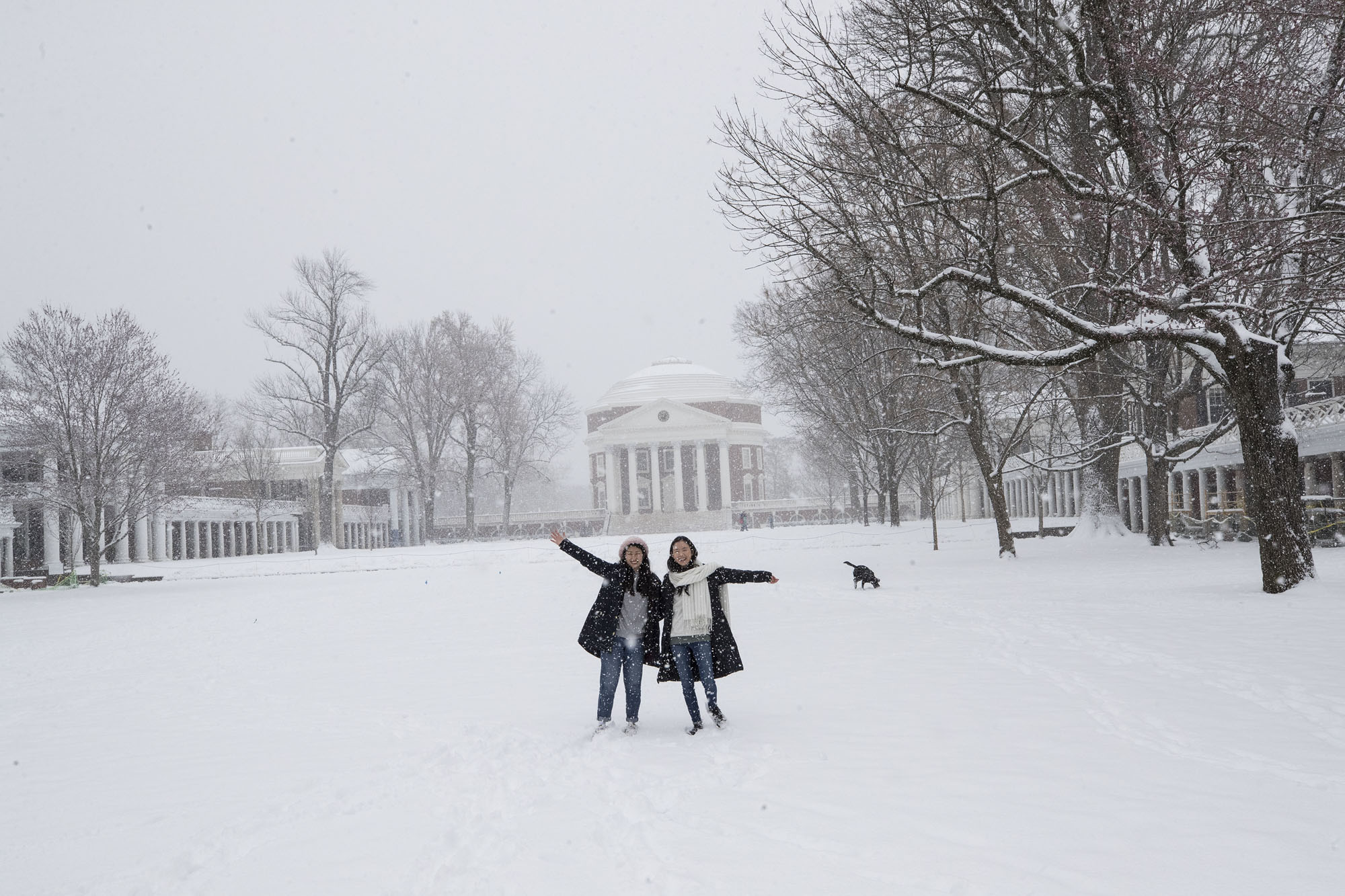 Students posing on Grounds  in the snow