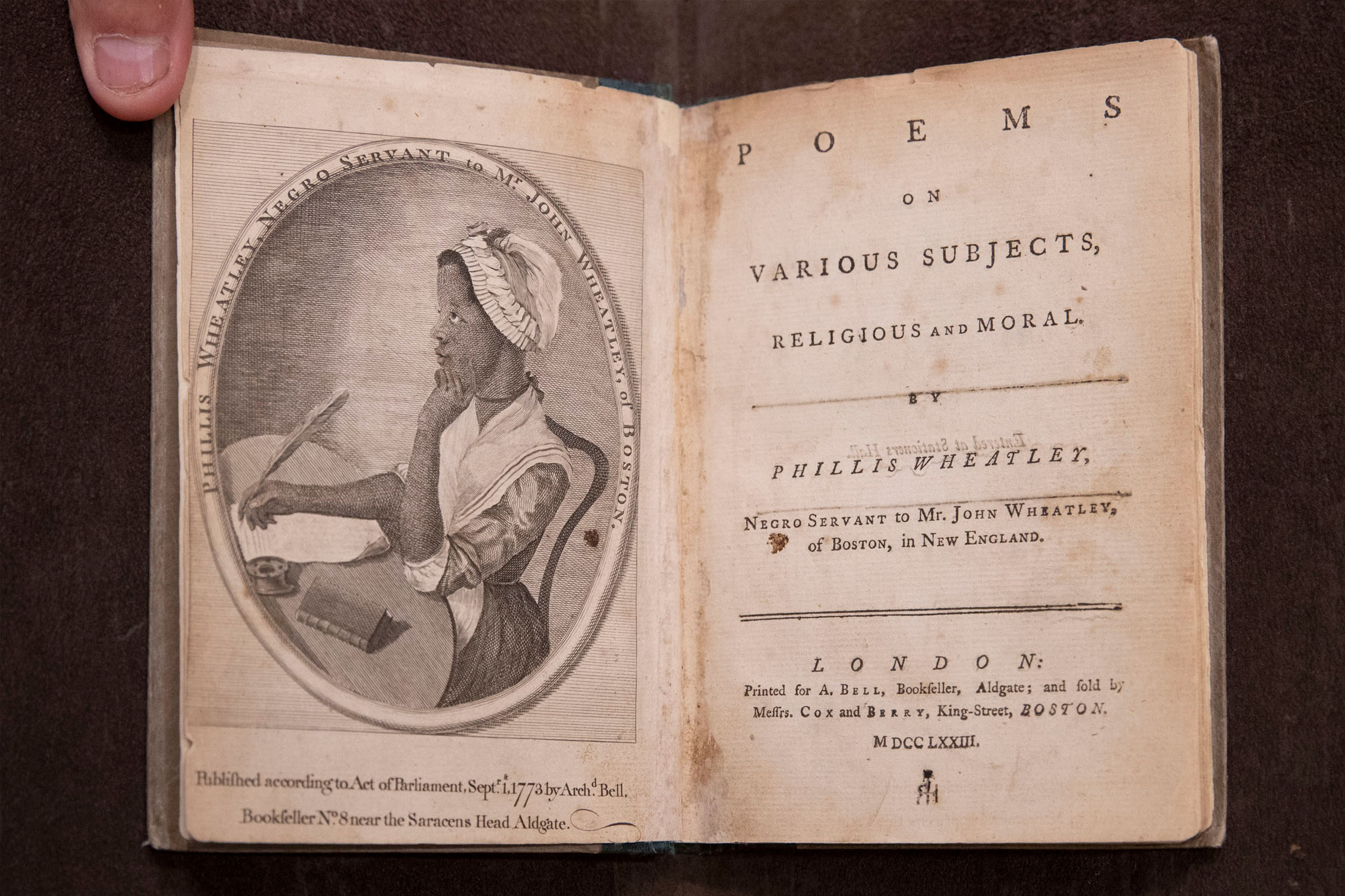 The opening pages of the a very old book.  Title page reads: Poems on various subjects, religious and moral Phillis Wheatley