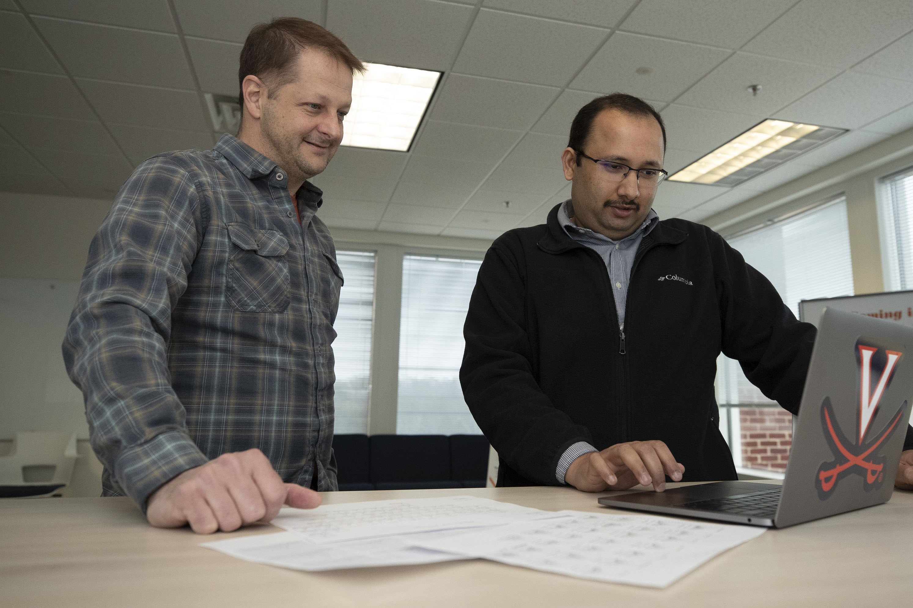 Srinivasan Venkatramanan, left, and Brian Lewis are working with AccuWeather to understand weather and flu outbreak patterns.