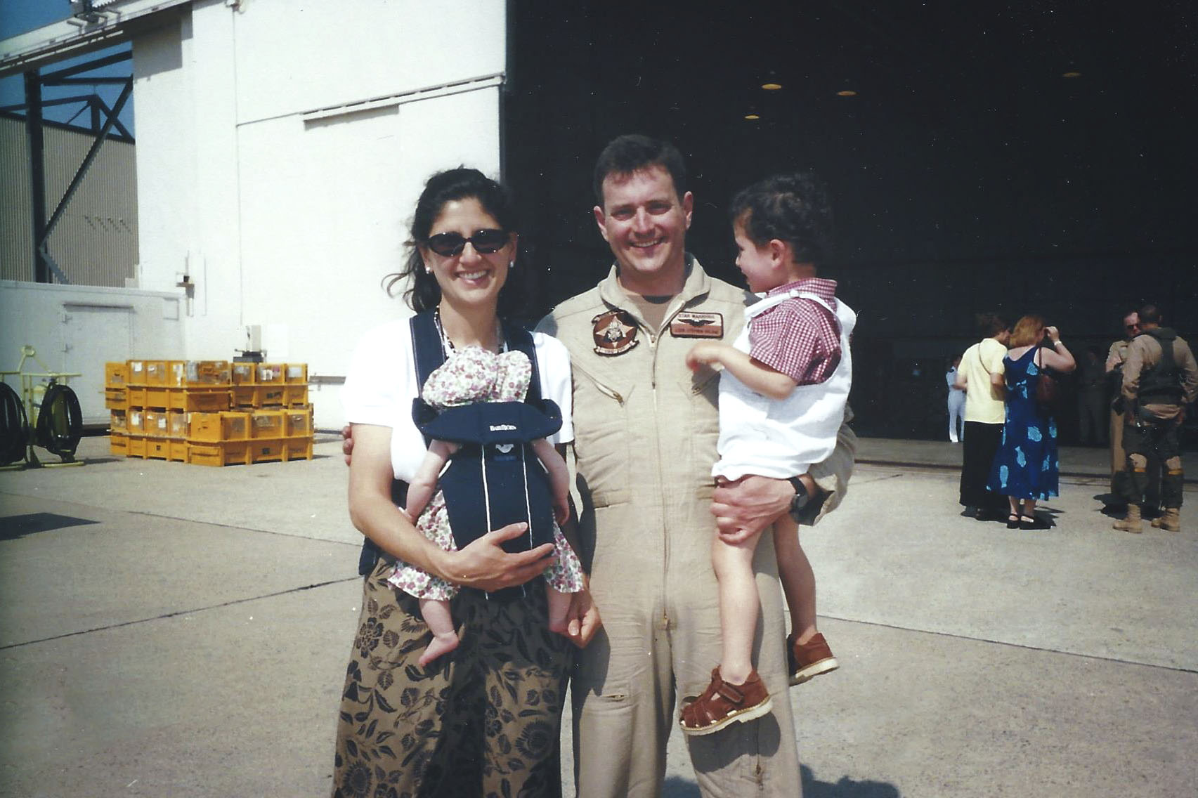 Steve Milone, with his wife Jasmine and their two children at Andrews Air Force base