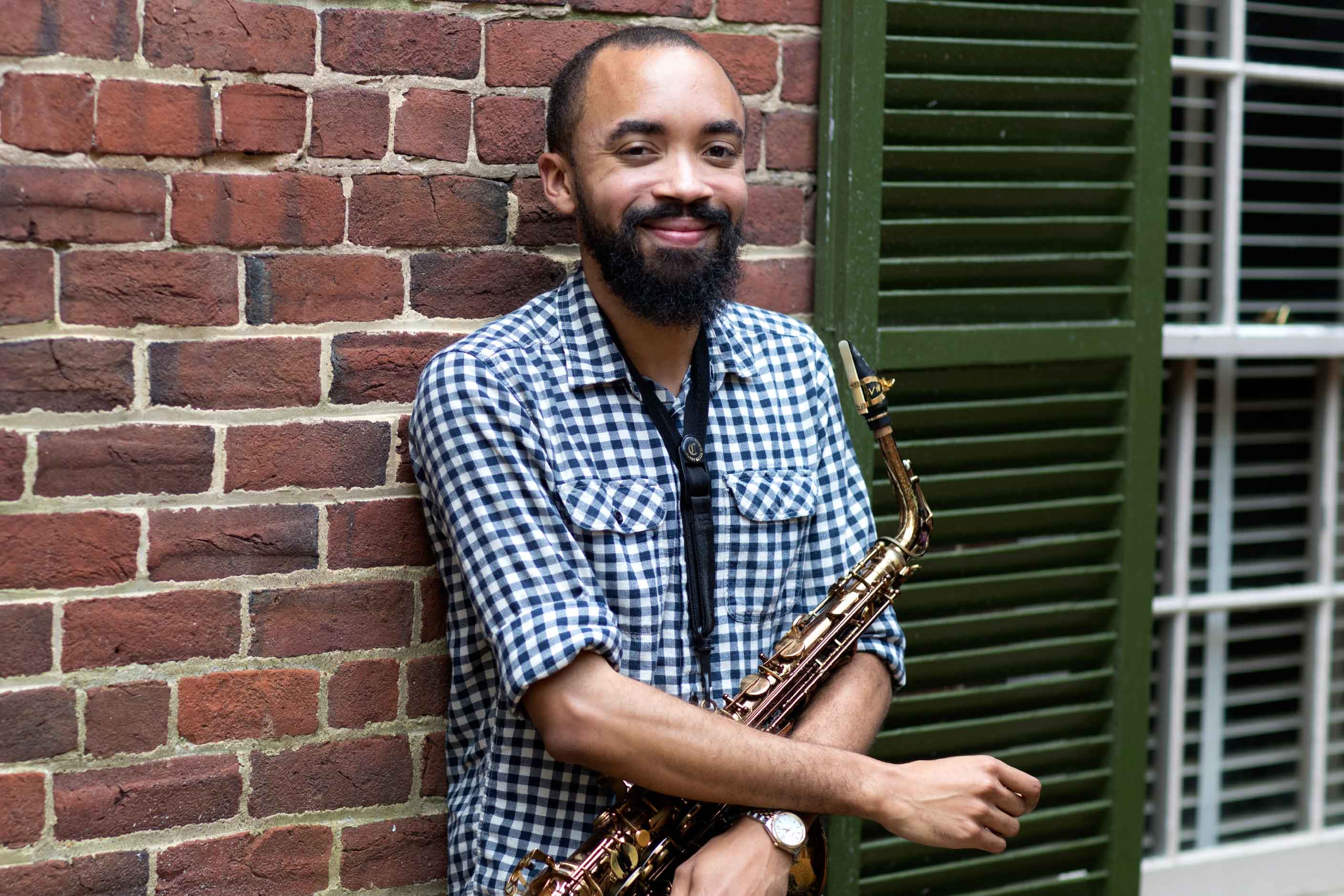 Lewis, pictured above, researched displays for the museum’s exhibits on African American music. (Photo by Dan Addison, University Communications)