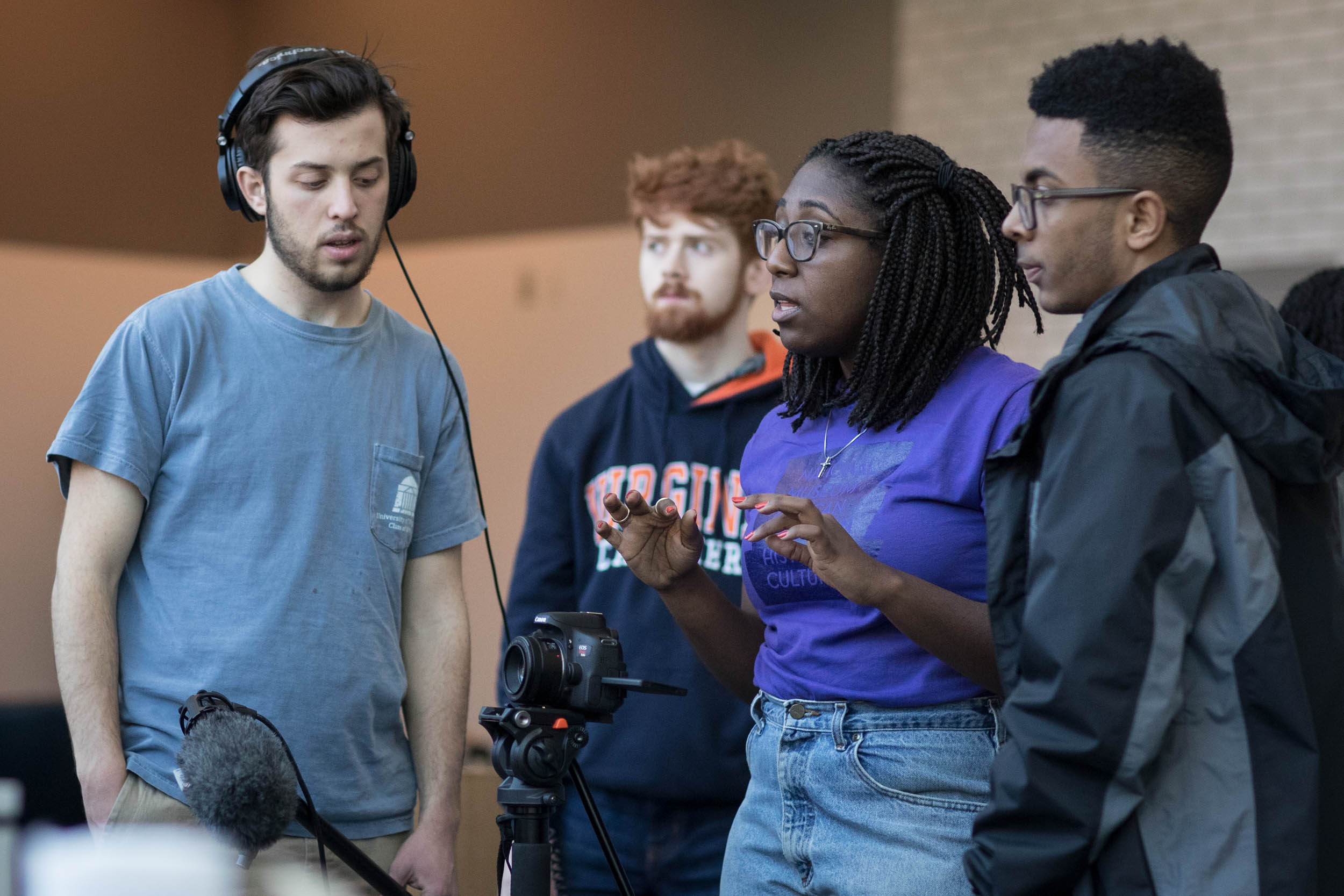 Watson, center, works with other students on a scene in Runk Dining Hall 