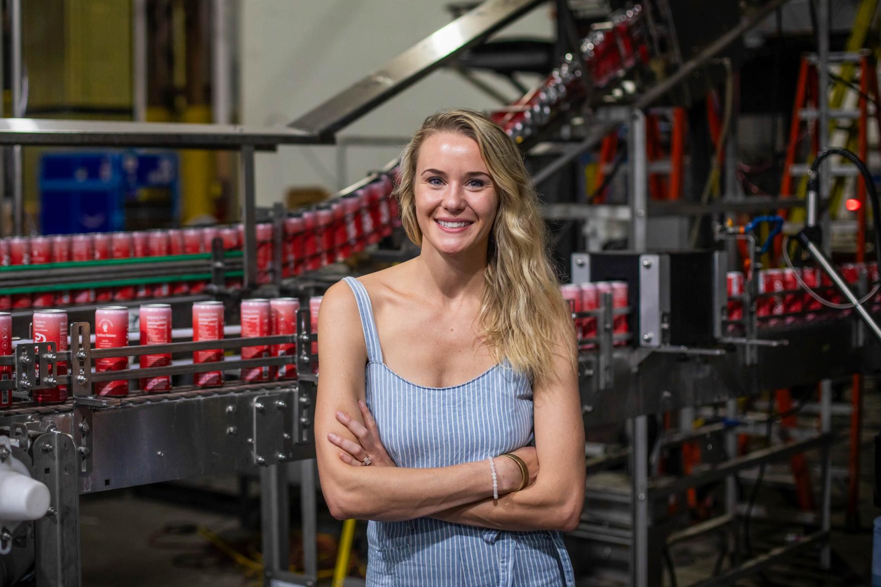 Portrait of Megan Riggs in the Crunchy Hydration factory