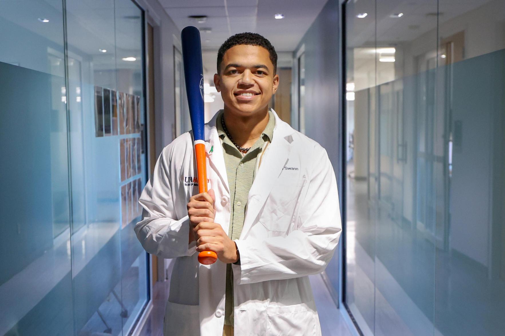Isaiah Swann with bat