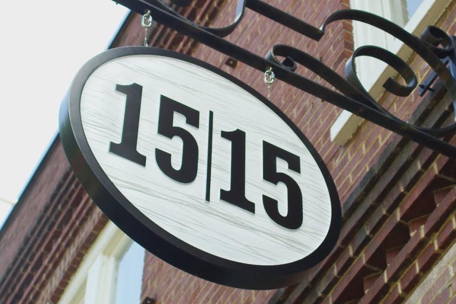 Hanging Business sign that reads 15 | 15