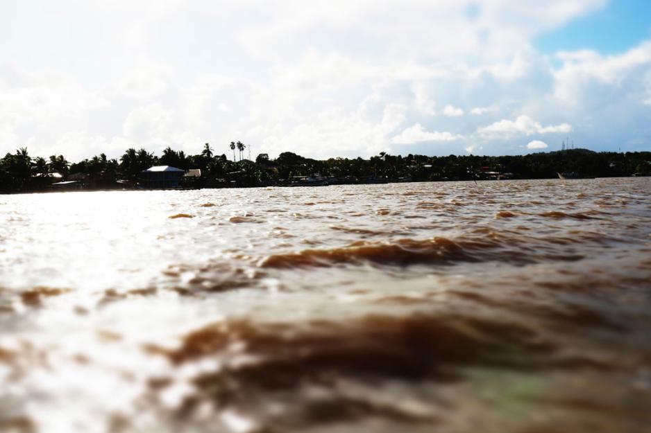 view of a town from brown water