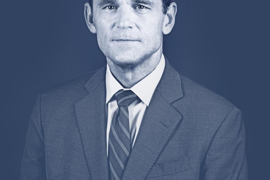 Portrait of President Jim Ryan in blue.