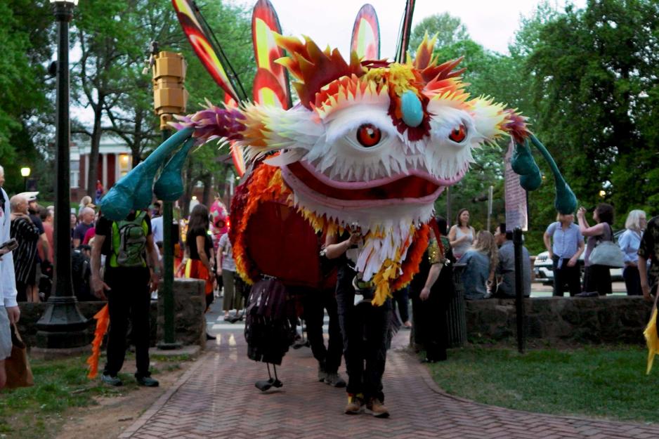Portrait of Flying creature Delia and sea creature Peri parade from Arts Grounds to the Rotunda.