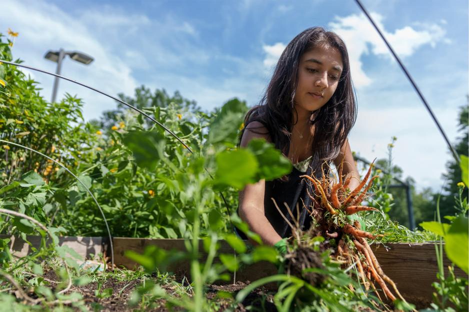 Portrait of a girl doing some gardening.