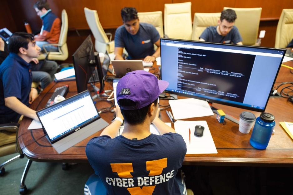 Portrait of UVA members of the Cyber Defense Team from left, Shreyas Mayya; Christopher Marotta, class of 2024.