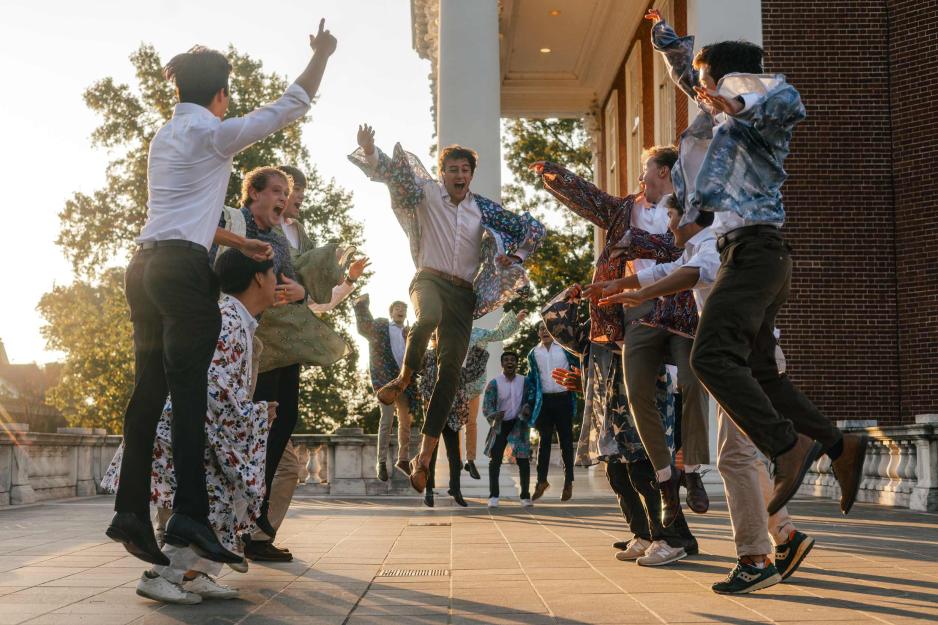 members of UVA Hullabahoos dancing and performing on grounds