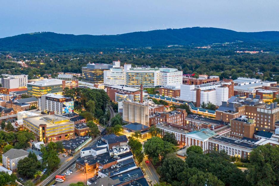 aerial photo of UVA Medical Center and surrounding buildings at dusk