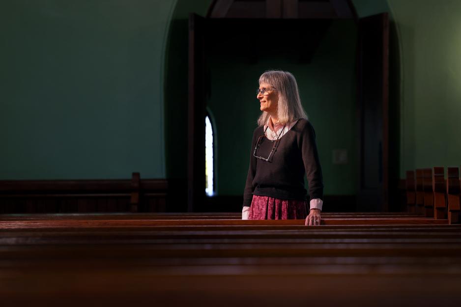 Candid photo of Barbara Moore inside the University of Virginia Chapel