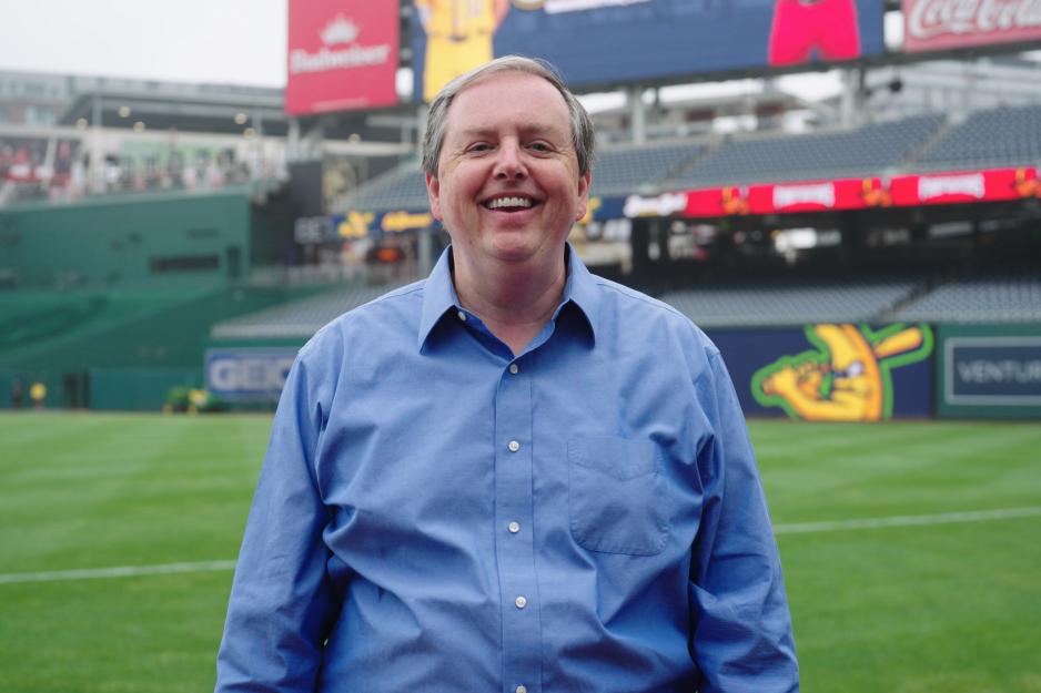 Les Alexander standing on the field at Nationals Park during a Savannah Bananas game