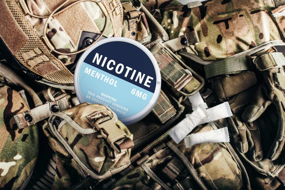 A nicotine tin buried among an Army uniform