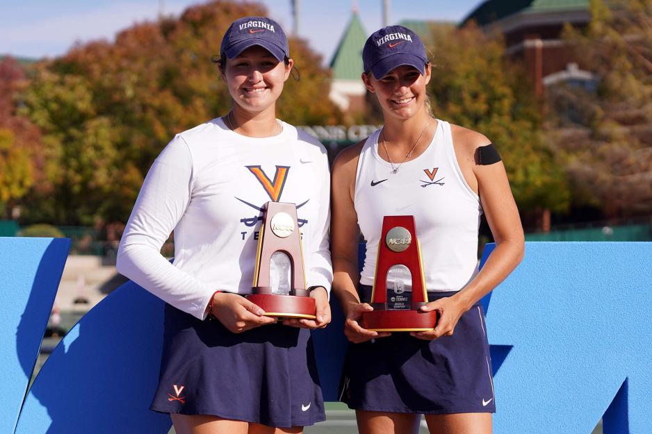 UVA’s Elaine Chervinsky and Melodie Collard holding the trophy 