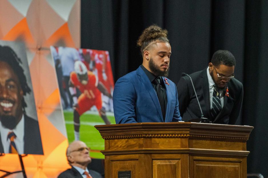 Cody Brown speaking at the memorial