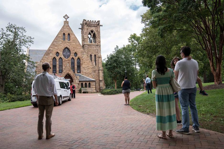People standing outside the UVA Chapel.