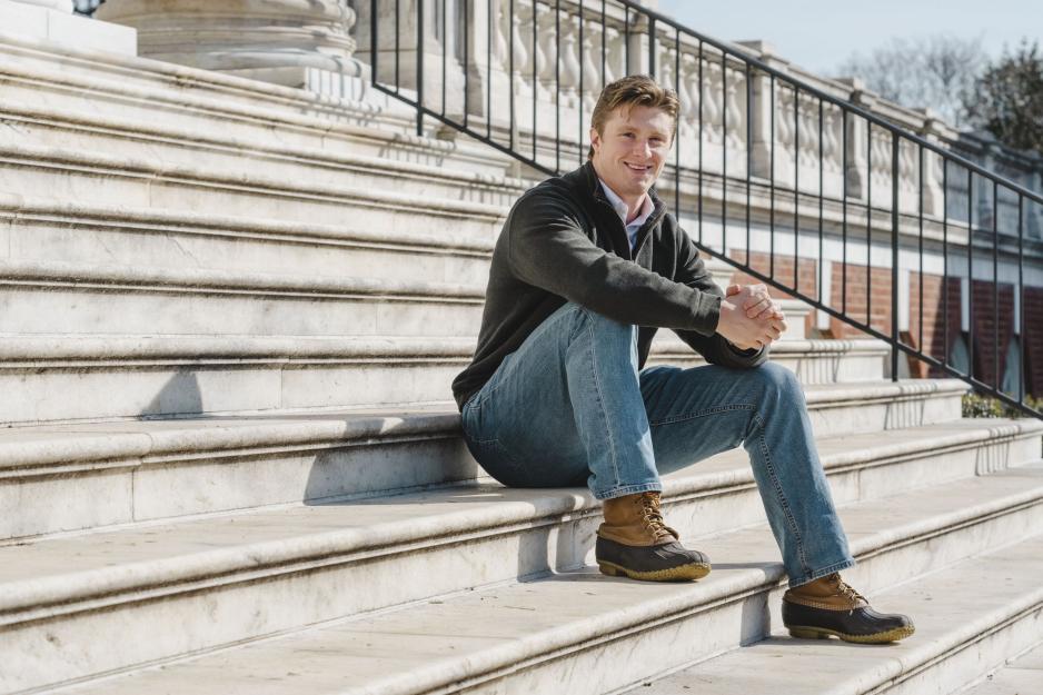 Douglas Pula sitting on the Rotunda Steps