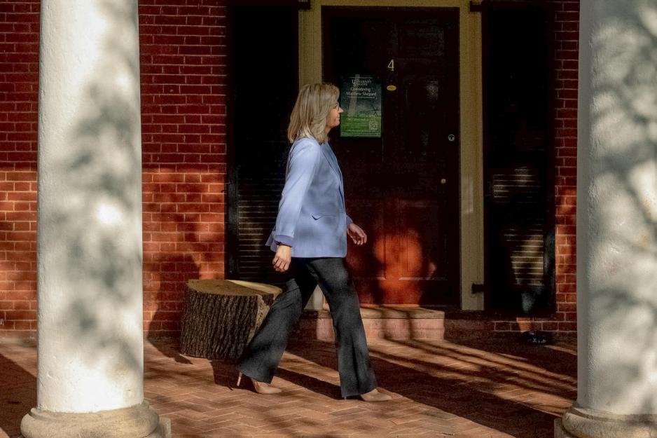 Former U.S. Rep. Liz Cheney walking along the Lawn rooms