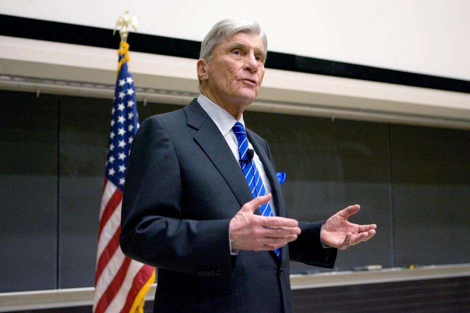 Former U.S. Senator John W. Warner talking in a classroom