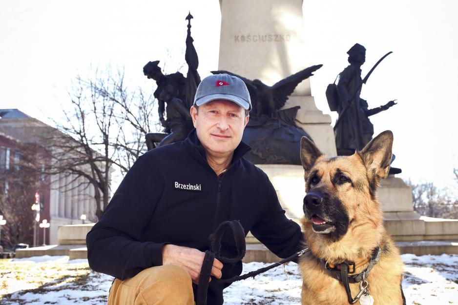 Mark F. Brzezinski and Teddy posing for a picture