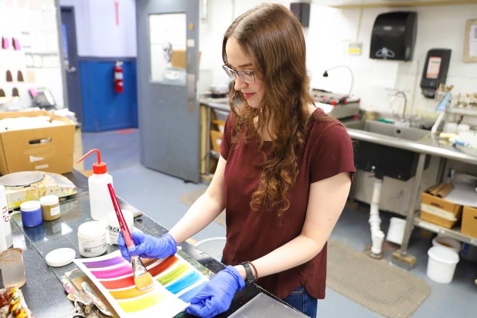 Anna Perkins mixing paint