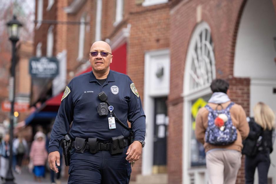 University Police Department officer Wallace Goode patrols along the Corner