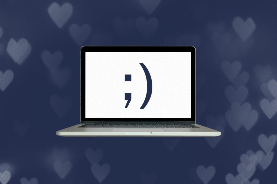 Illustration of a winking smail on a laptop screen
