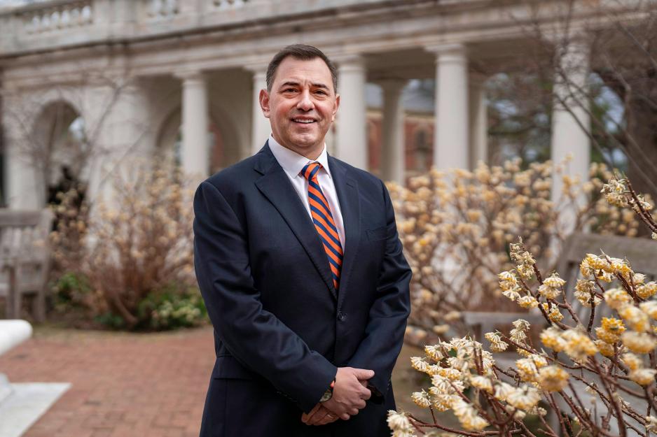 Portrait of Augie Maurelli in a courtyard outside the Rotunda