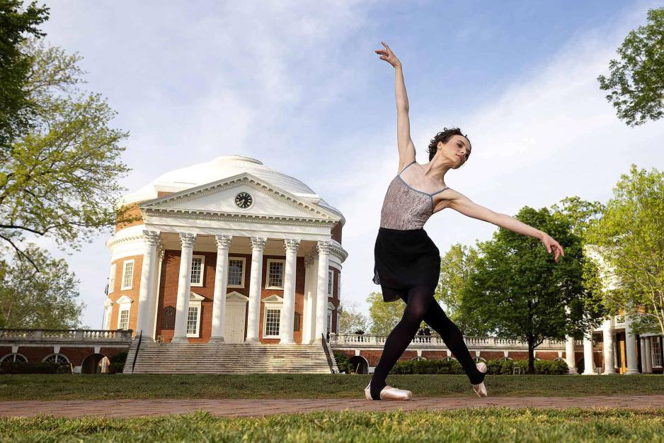 Molly Yeo dances in front of the Rotunda