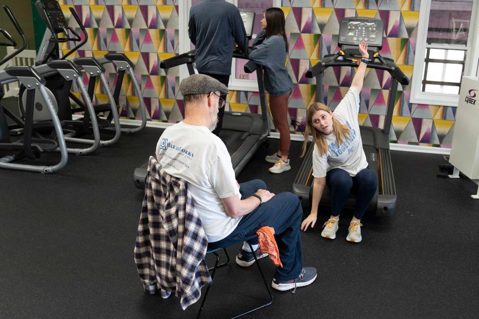 UVA student helping a Innisfree member