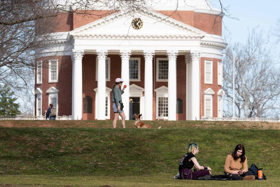 Students sitting on the Lawn in front of the Rotunda