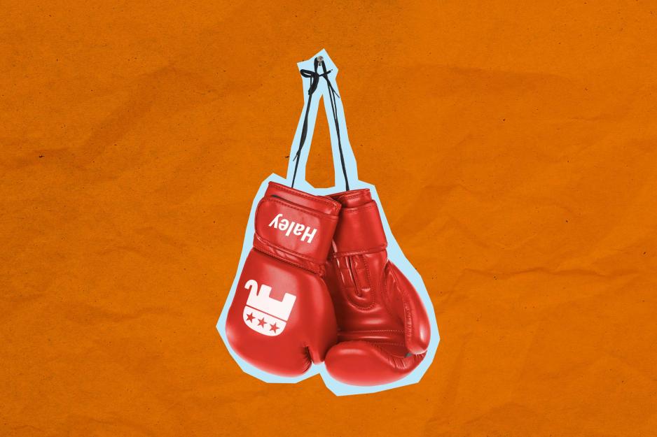 A pair of boxing gloves on an orange background