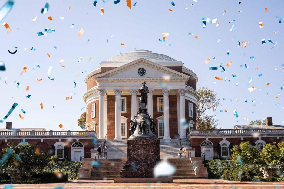 Illustration of orange, blue, and white confetti overlaying a photo of the Rotunda